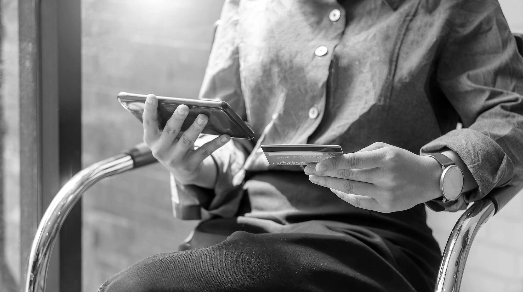 Digital banking technology on a laptop and smartphone representing open banking, financial data sharing and fintech regulation Digital banking technology on a laptop and smartphone representing open banking, financial data sharing and fintech regulation